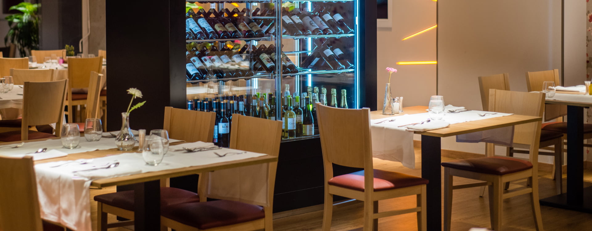 Restaurant with fridge fridge with bottles of red wine