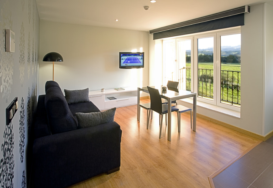 Fully equipped living/dining room with views to the outside