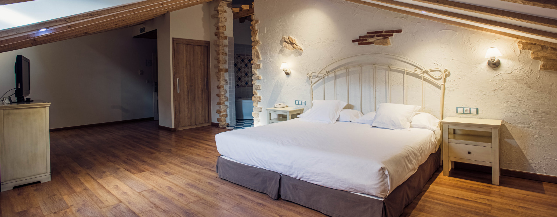 Photomicrograph of one of the hotel rooms with double bed