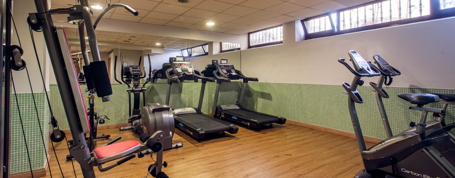 Gymnasium with machines in Los Pasiegos group accommodation